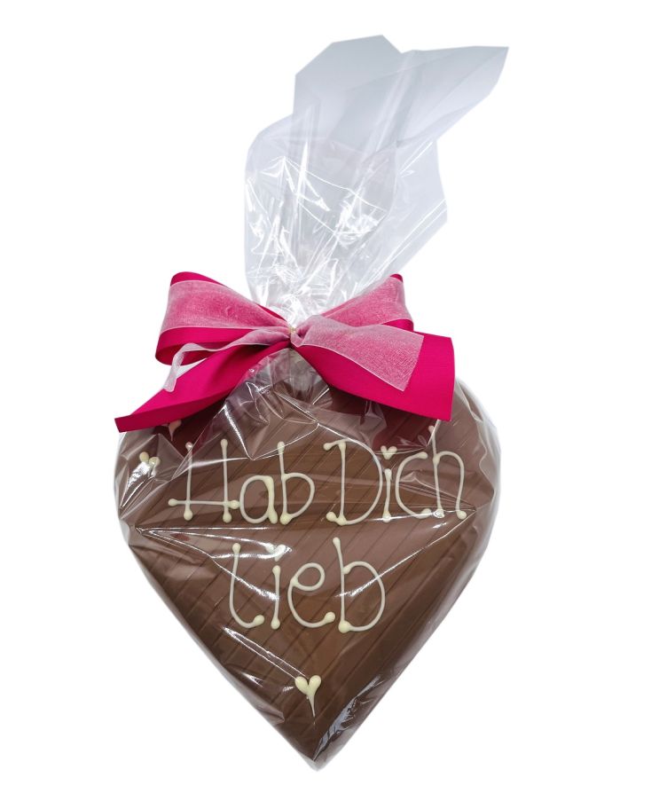 Verpacktes Klett Schokoladen Herz mit der Botschaft "Hab dich lieb"