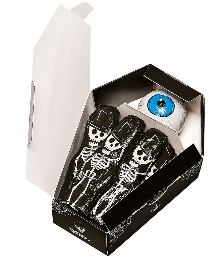Geöffneter Klett Halloween Sarg mit Schokoladen Skeletten und einem Schokoladen Auge